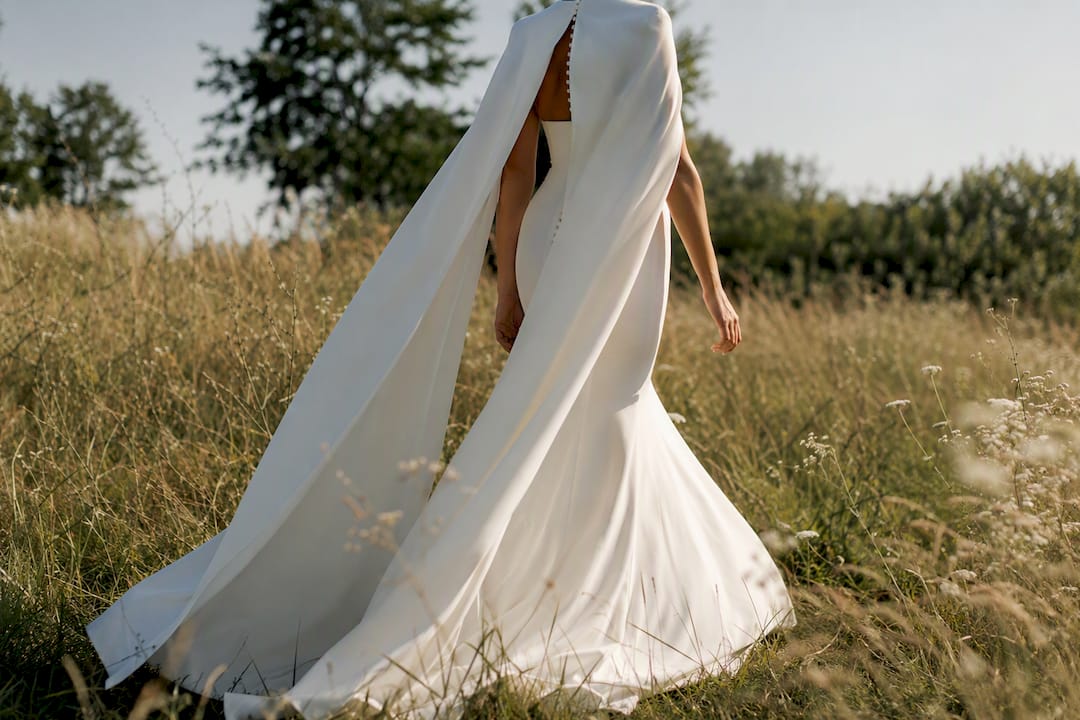Bridal cape silhouette outdoors, side view