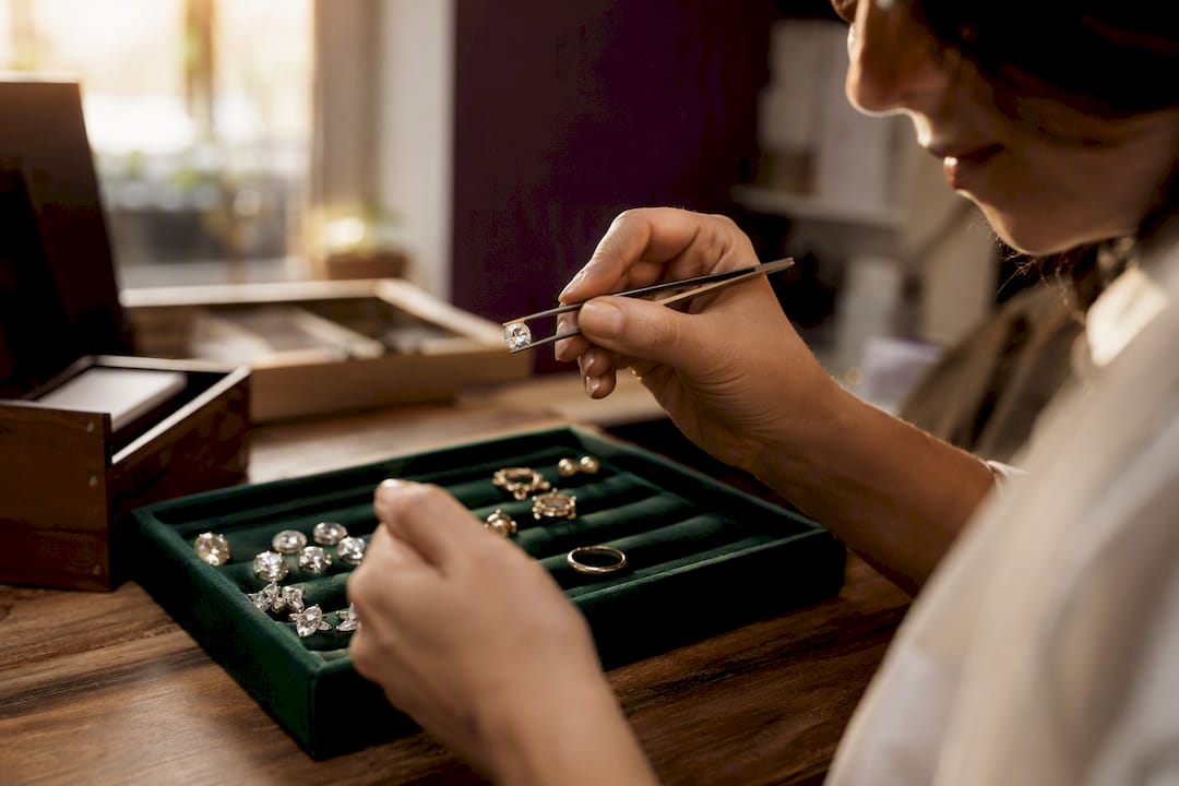 Jeweler examining lab-grown moissanite gemstone