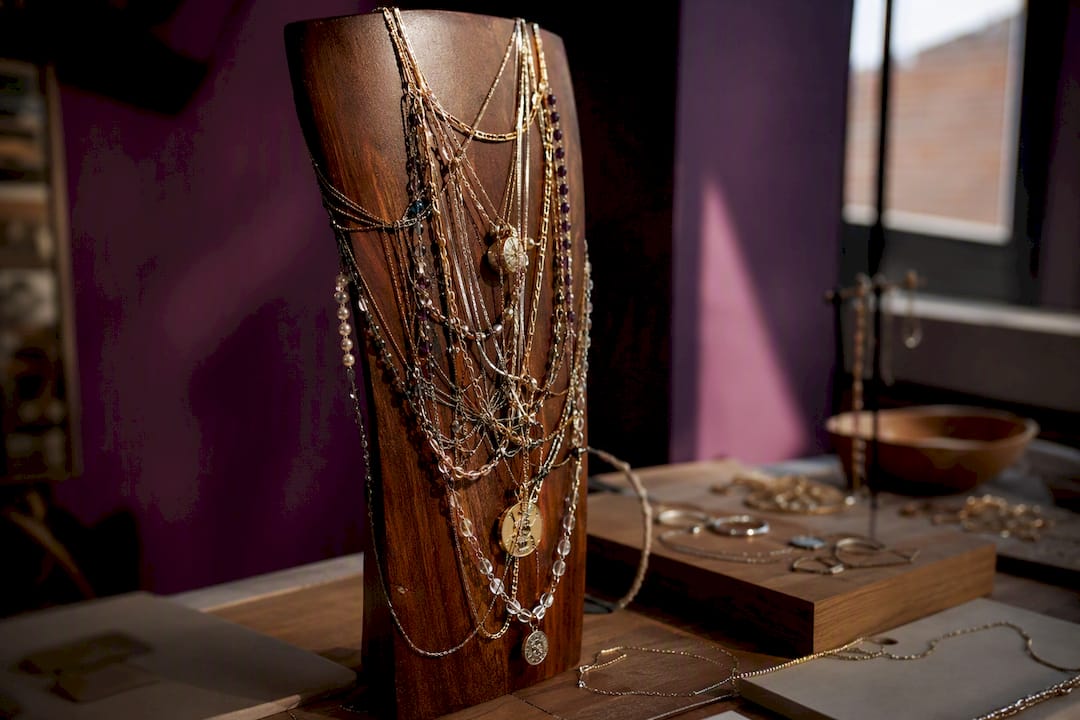 Closely layered necklaces illustrating styling mistakes