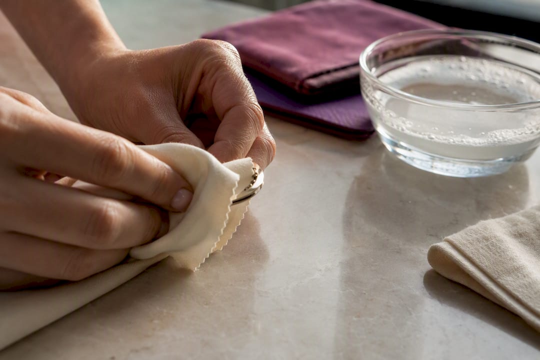 Soft cloth polishing jewelry before storage
