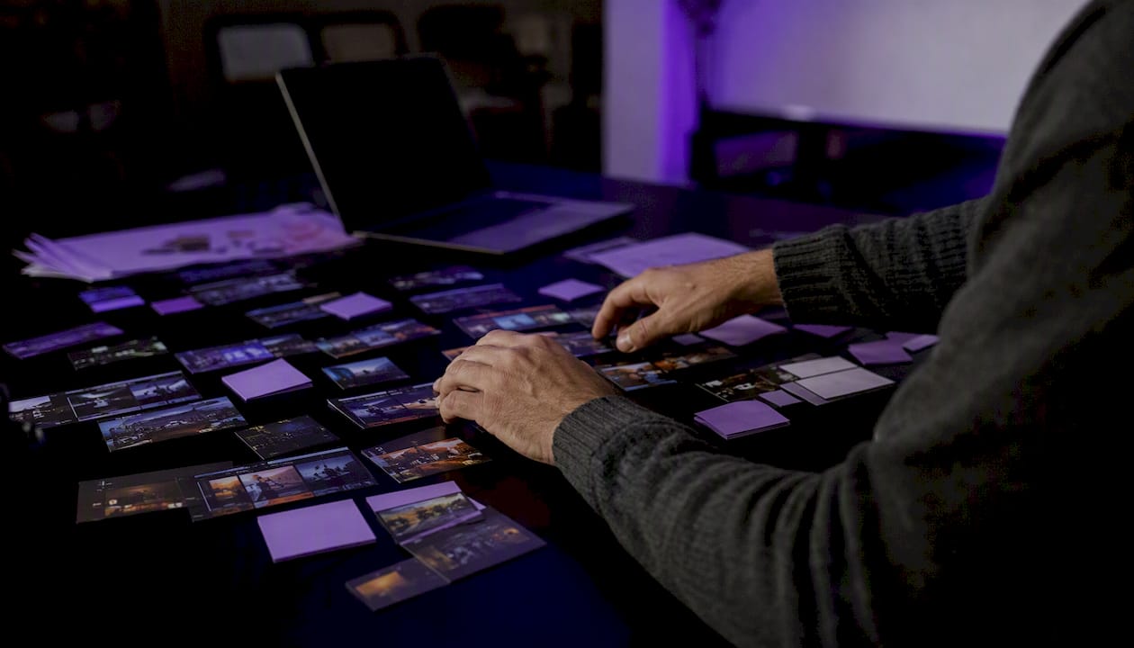 Hands sorting content clips before CMS