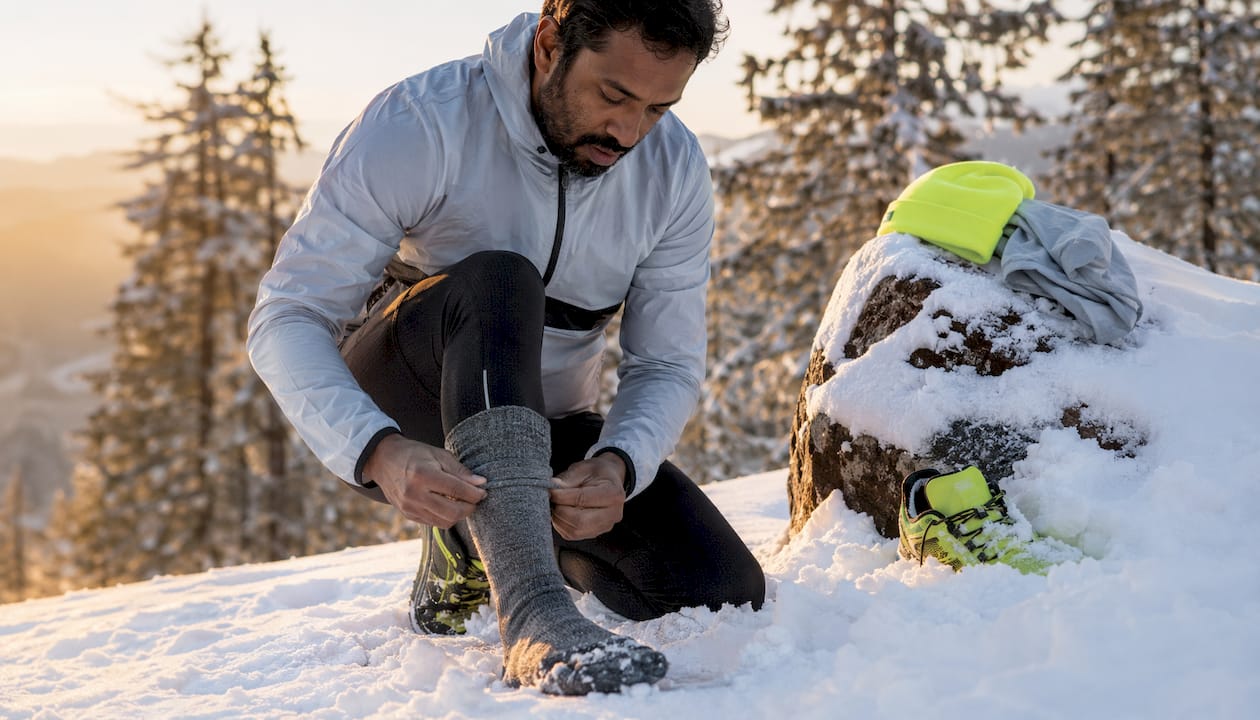 Runner adjusting winter merino wool socks