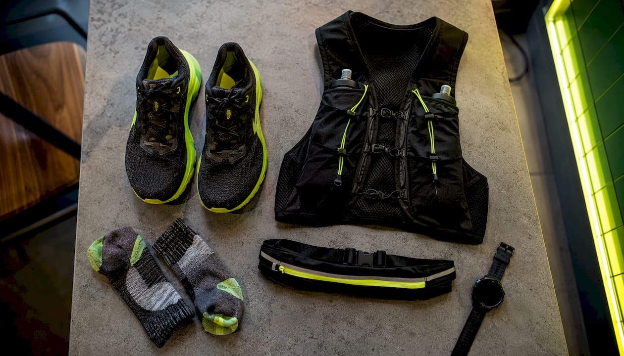 Flat lay of practical running gear and accessories