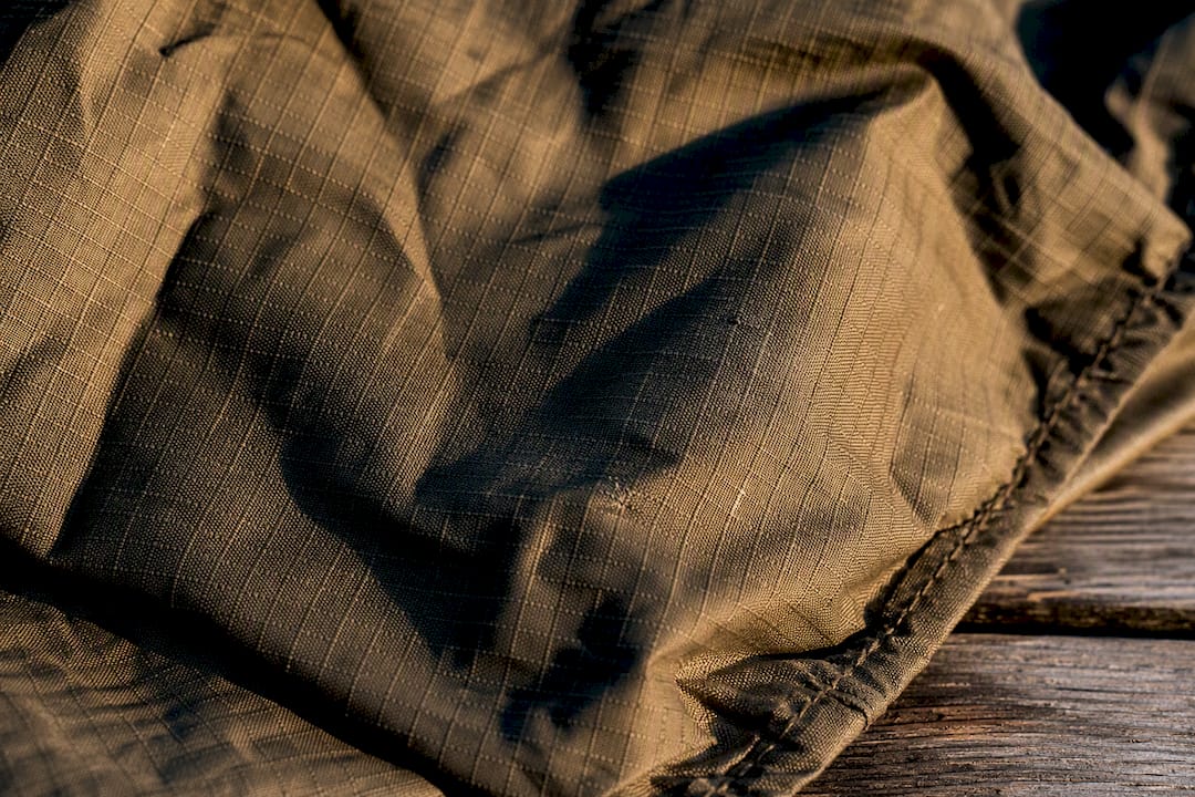 Ripstop nylon fabric detail with grid pattern