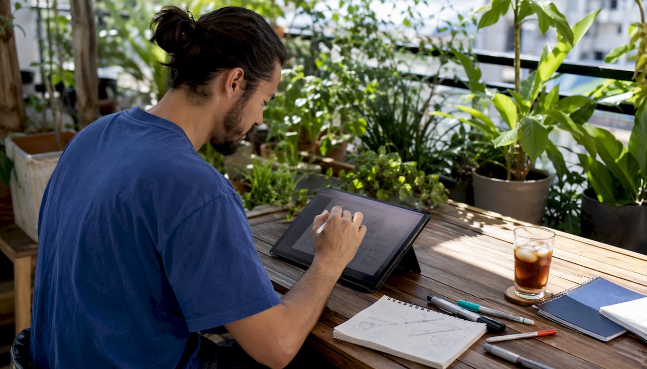 Freelance designer working at home desk