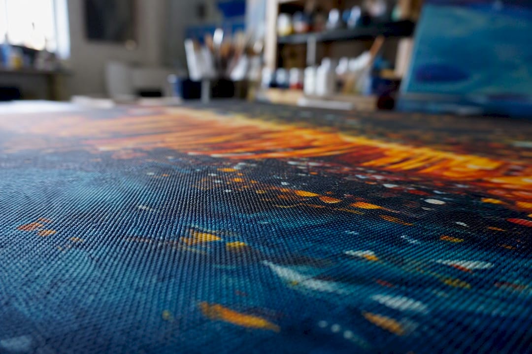 Close-up of giclée print detail on canvas surface