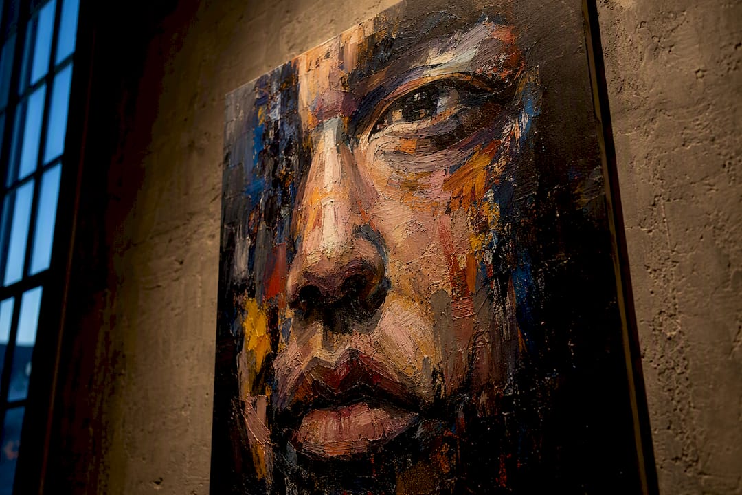 Close-cropped face on canvas painting