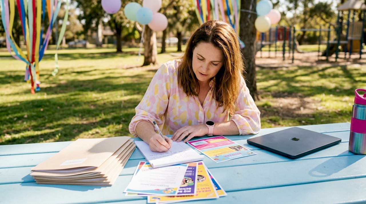 Event coordinator organizing school event materials