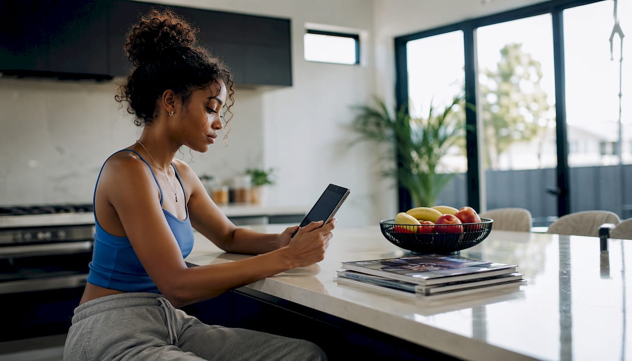 Woman using tablet for multiplayer game finder