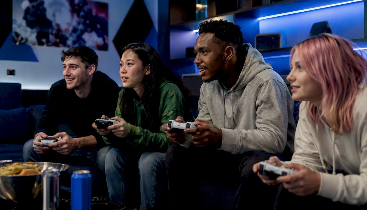 Friends playing couch co-op video games