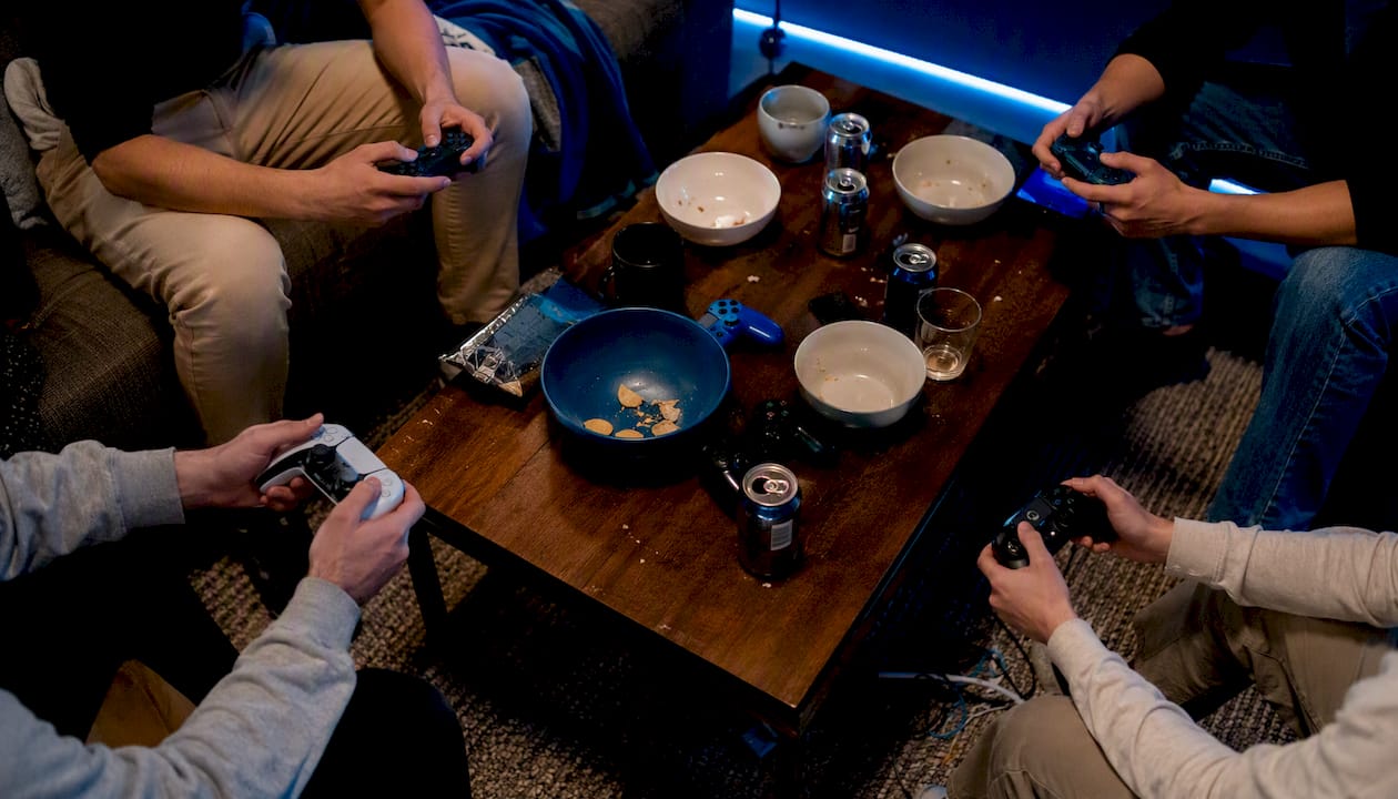 Hands playing chaotic party co-op video game
