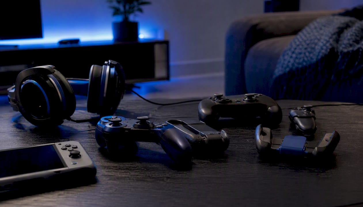 Mixed gaming accessories on table for multiplayer