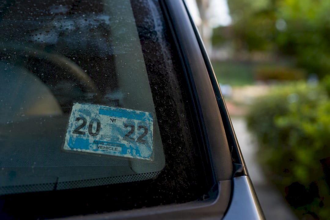 Vehicle rear window with expired registration sticker