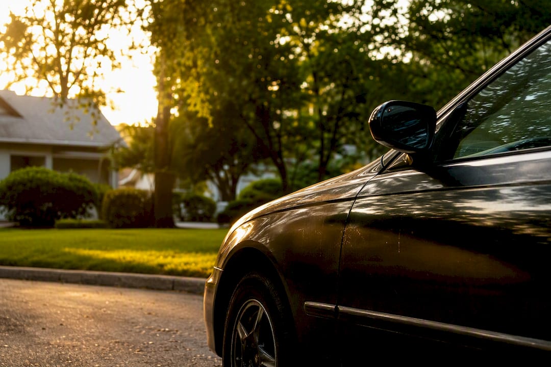 Silhouette of parked vehicle at dawn