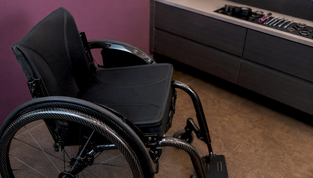 Close-up of ultralight manual wheelchair frame