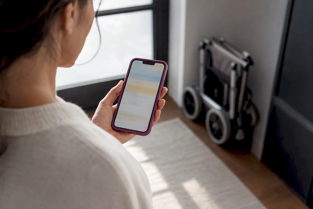Caregiver reviewing rental cleaning log photo