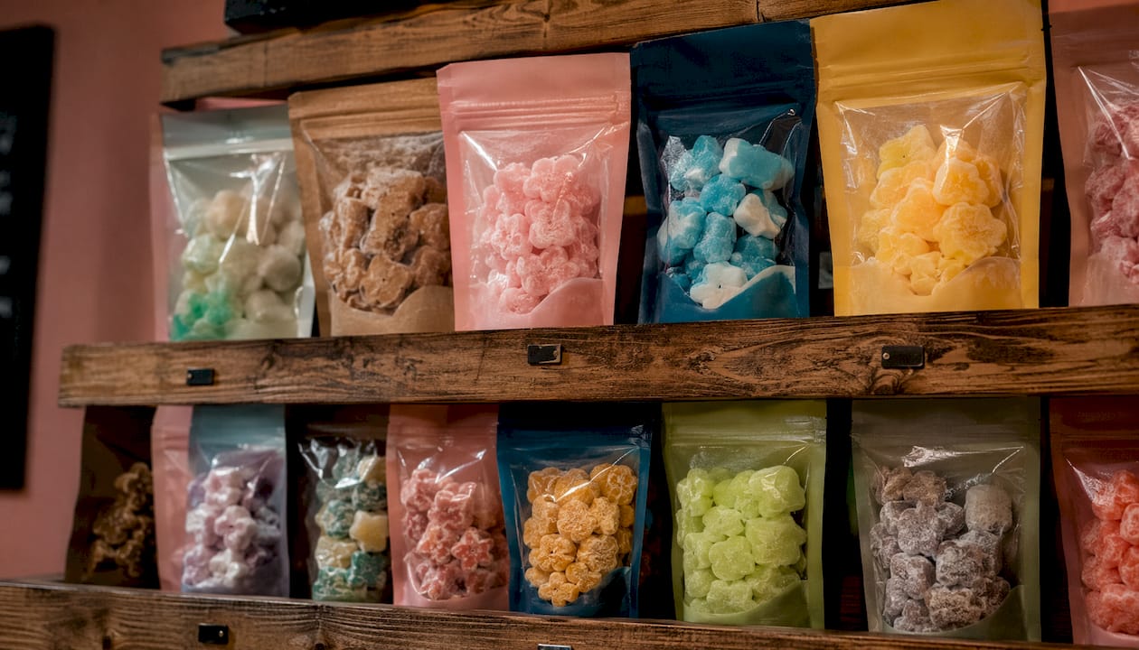 Retail shelf with freeze-dried gummy packages