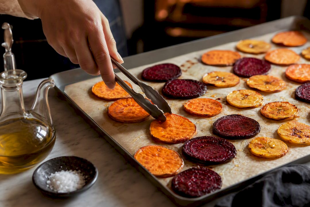 Vegetable rounds crisping on baking tray