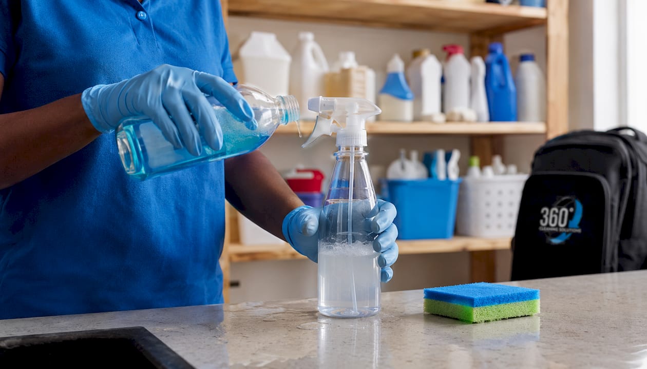 Hands mixing detergent for cleaning