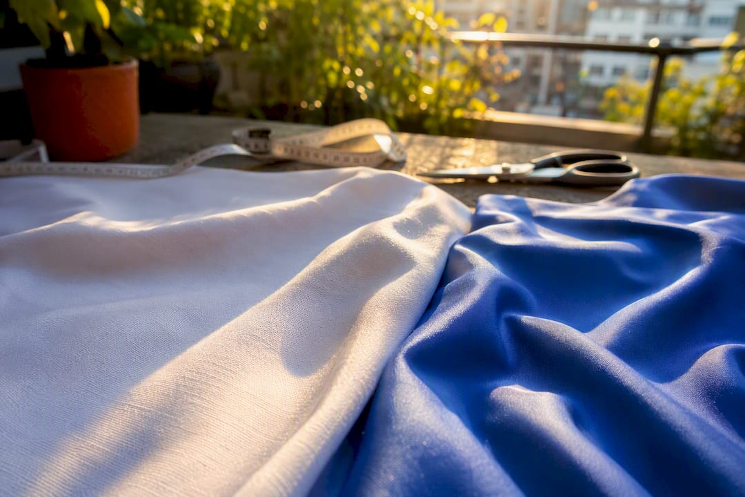 Cotton and polyester fabric textures side by side