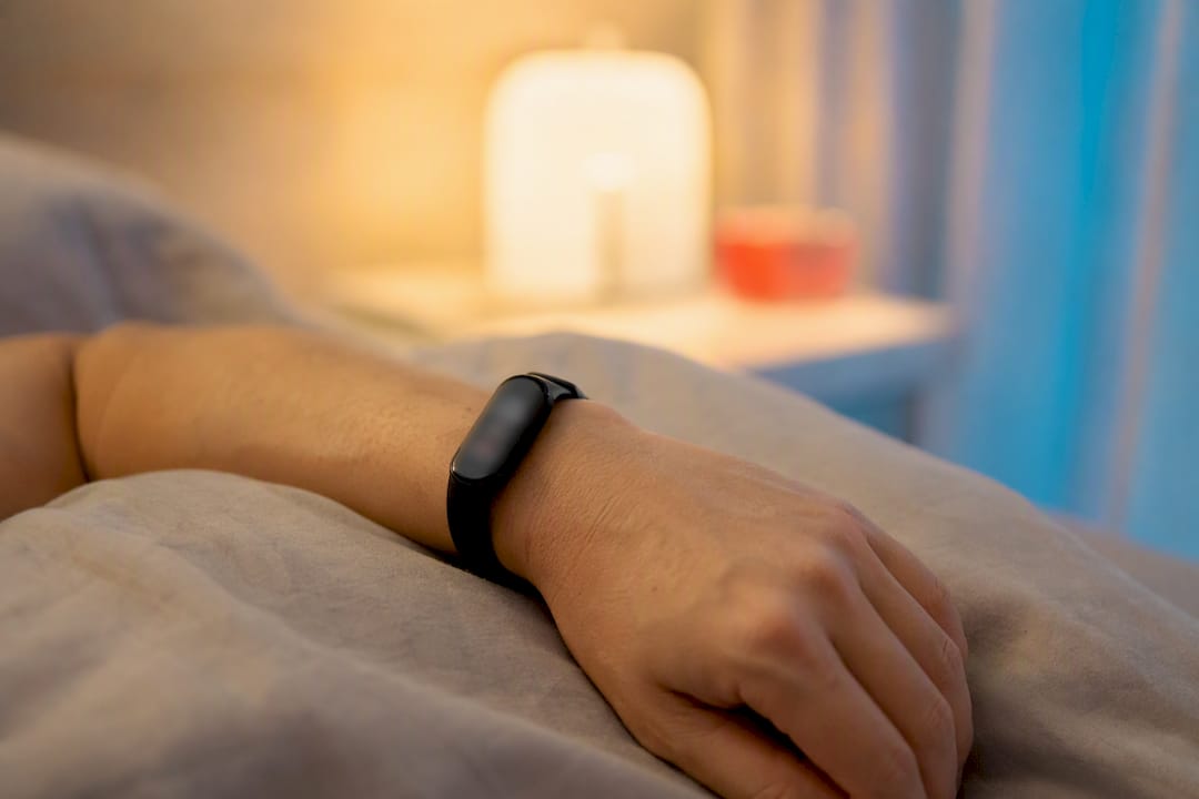Close-up of wrist wearing sleep tracker device