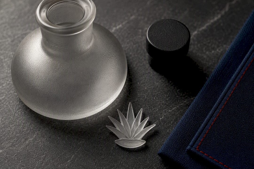 Frosted glass and embossed agave packaging details