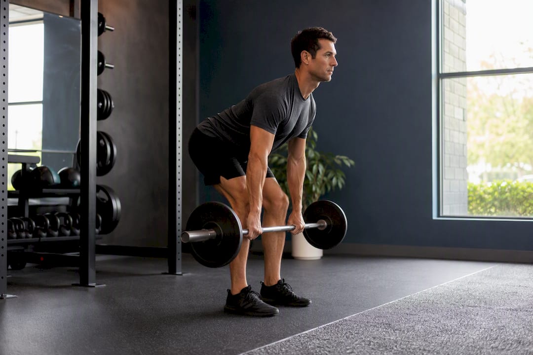 Person performing deadlift with correct hip hinge
