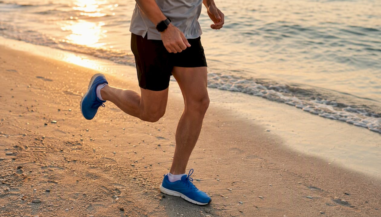 Runner mid-stride counting cadence steps