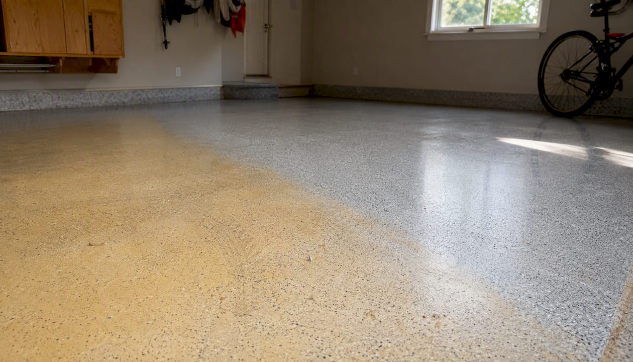Sunlit garage floor showing yellowed epoxy coating