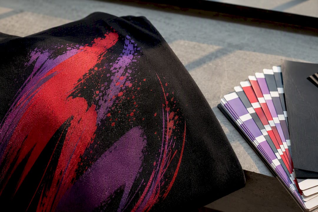 Printed garment sample viewed in soft daylight