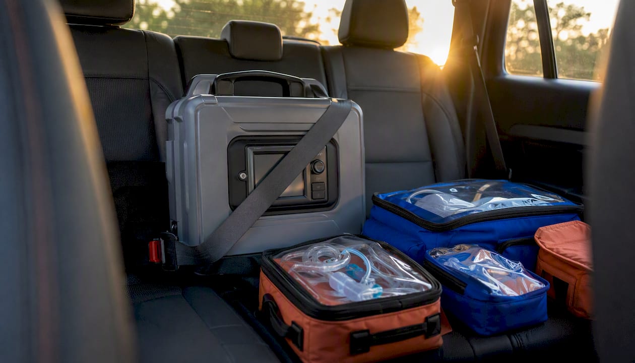 Ventilator equipment secured in car back seat