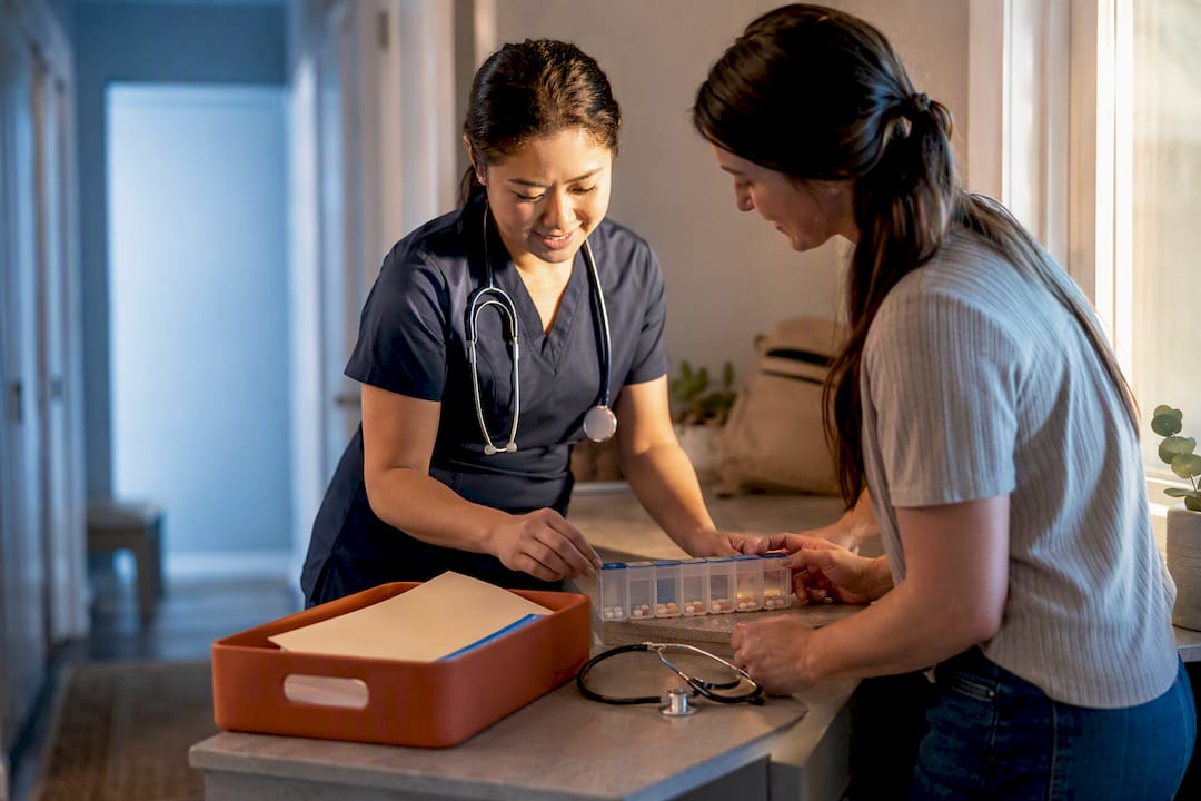 Parent and nurse preparing home nursing assessment
