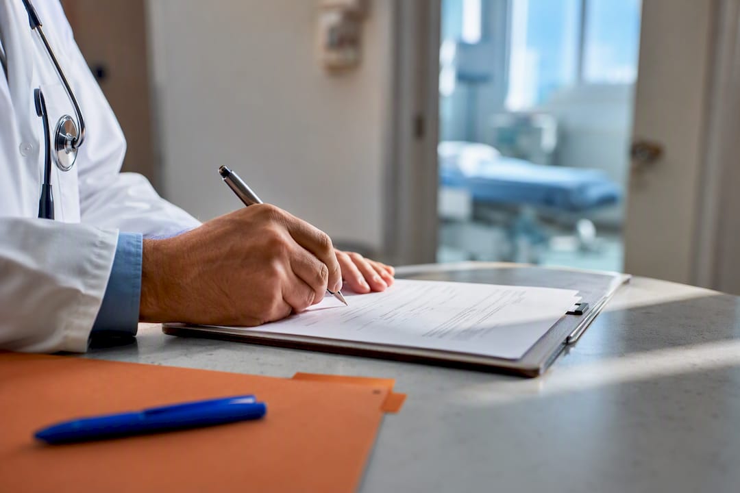 Physician signing pediatric medical order