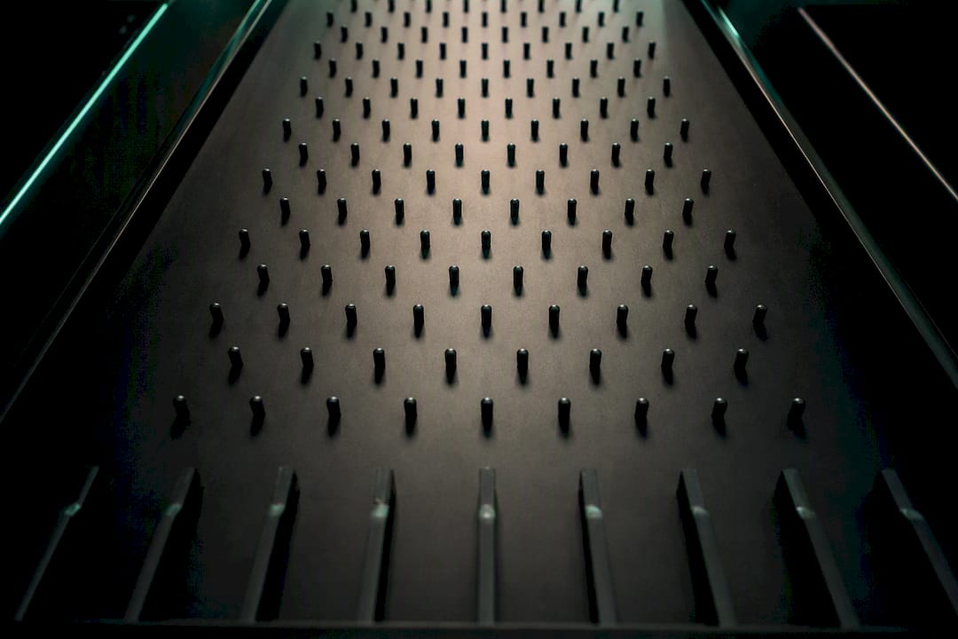 Symmetric plinko pegboard close-up