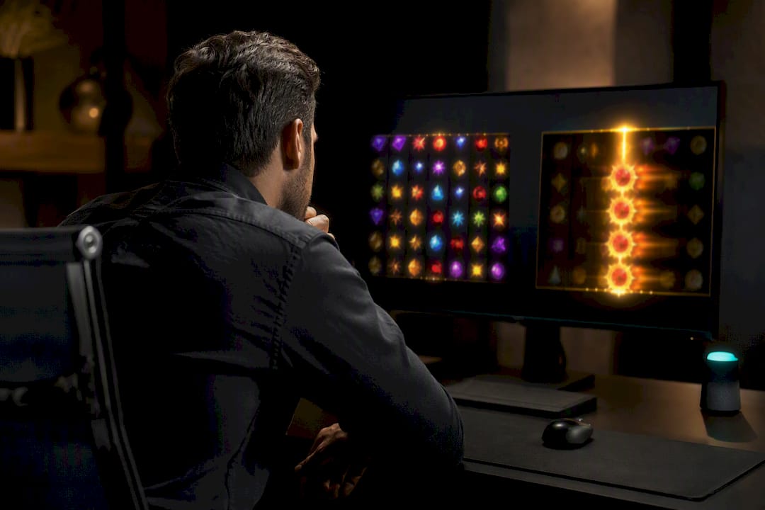 Gambler viewing contrasting slot payout patterns