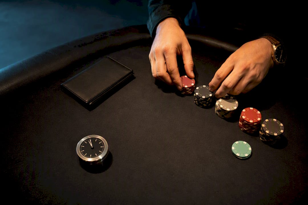 Casino chips divided into session bankroll stacks