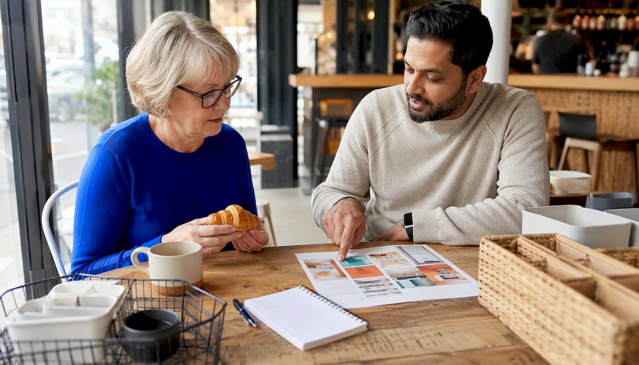 Professional and client discussing home organization plan