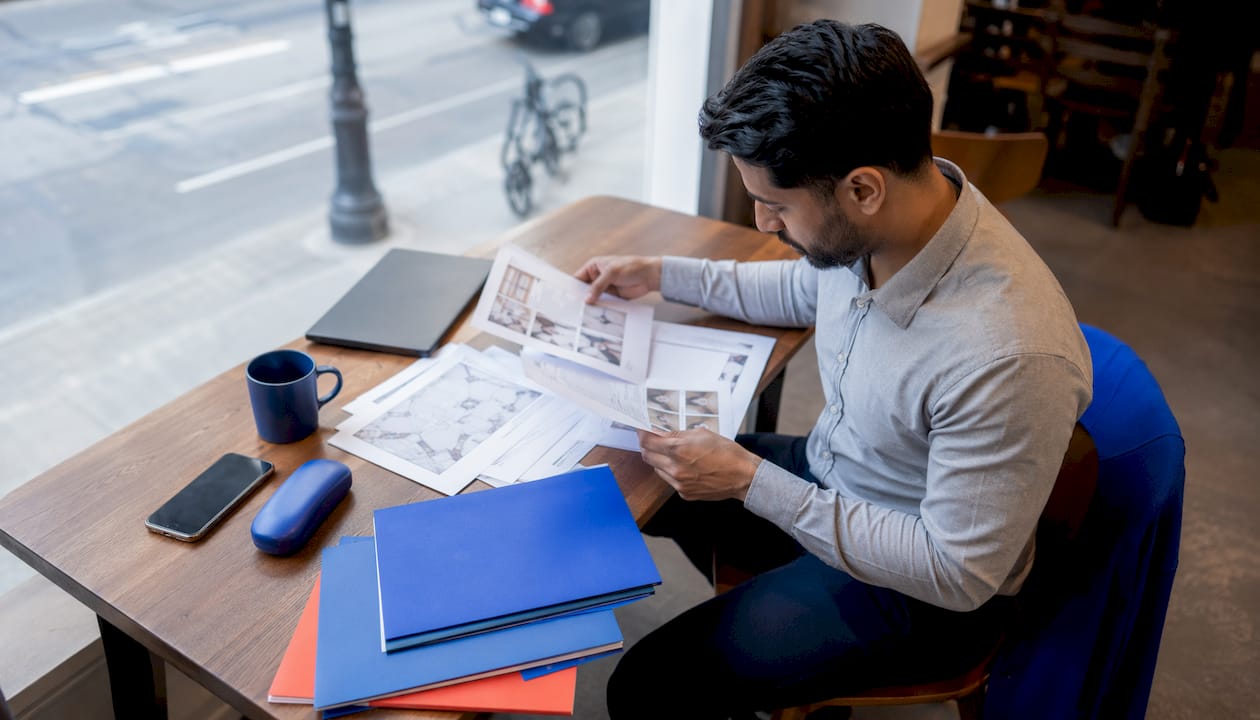 Professional organizer reviewing client plans in Toronto office