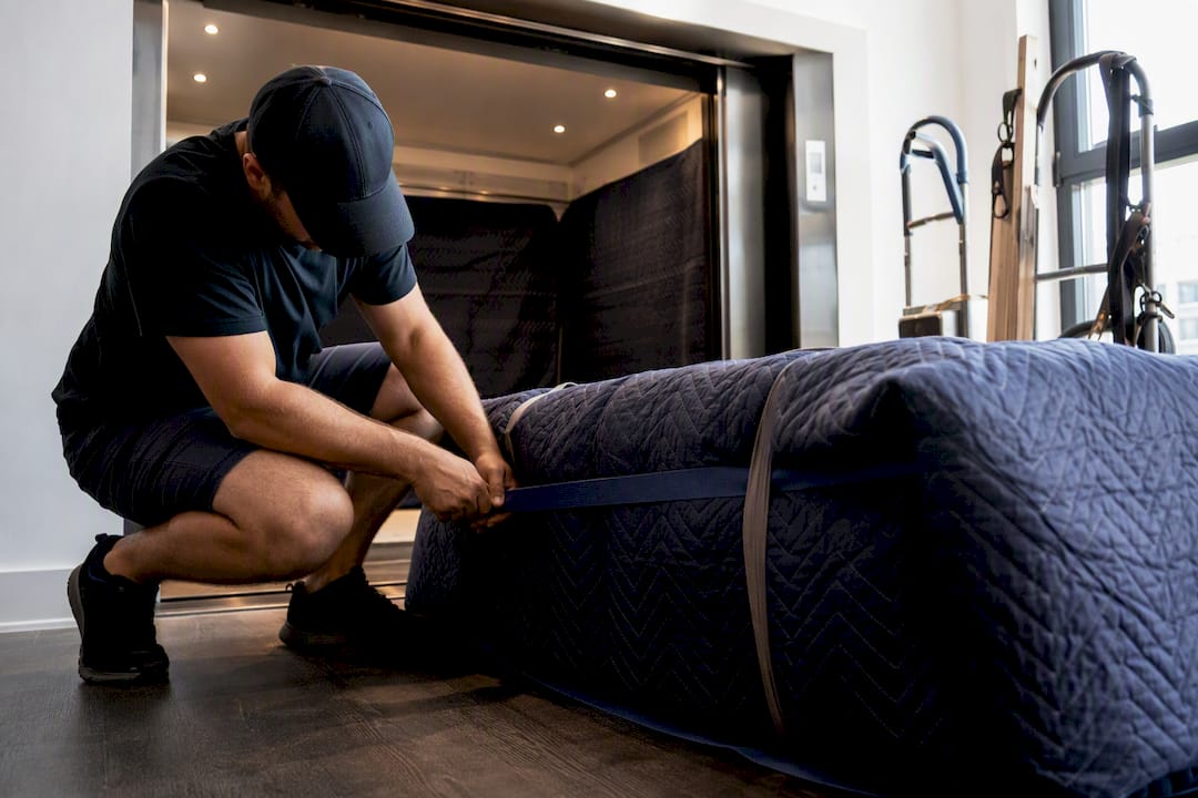 Mover wrapping sectional sofa for elevator move