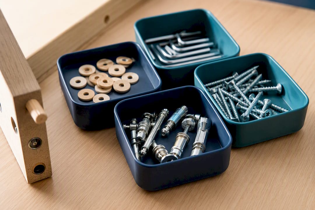 Furniture bolts and screws sorted into compartments