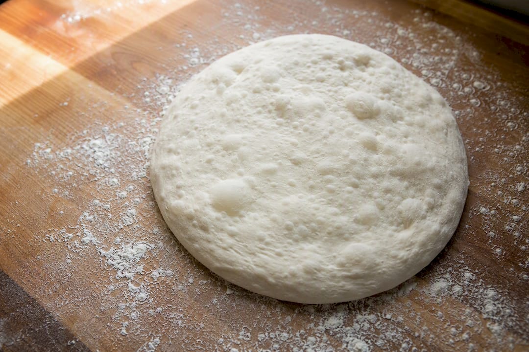 Close-up of Neapolitan-style pizza dough texture