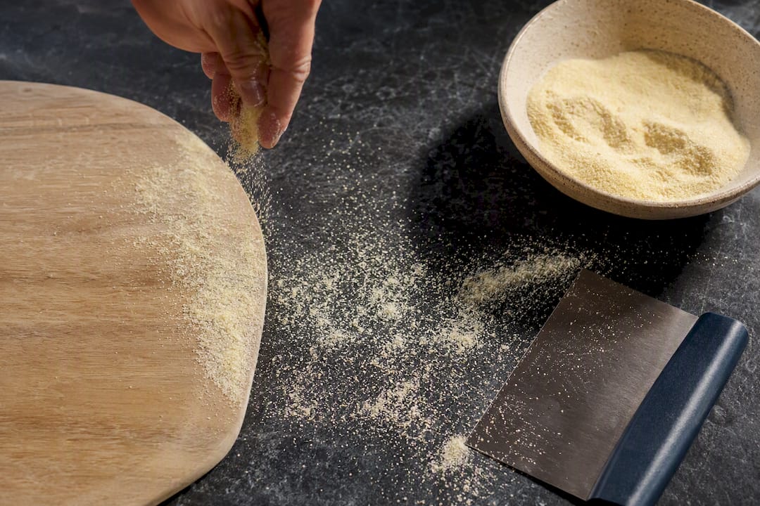 Semolina scattered on pizza peel