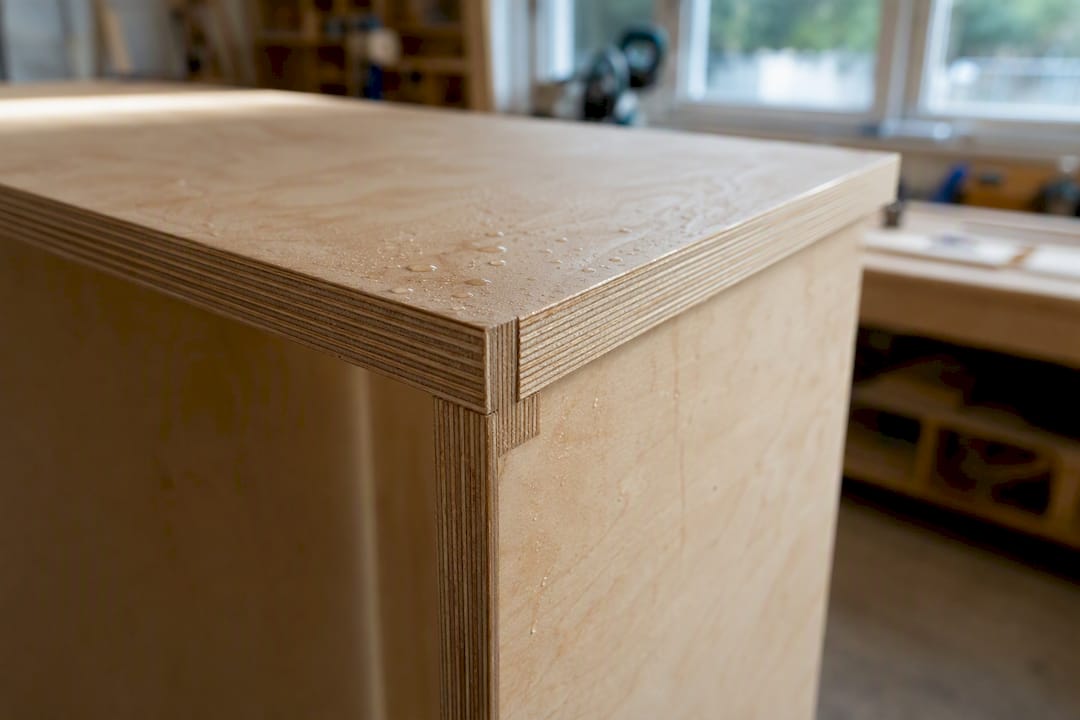 Close-up of plywood cabinet box corner joint