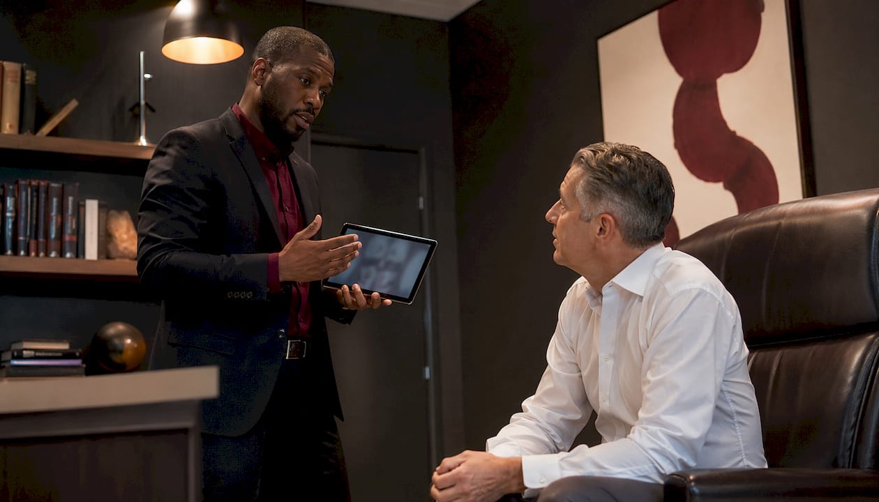 Doctor consulting patient about testosterone therapy