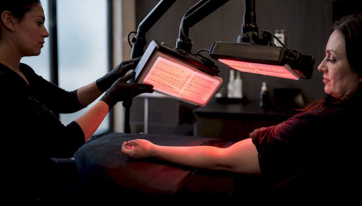 Red and near-infrared therapy on patient’s arm