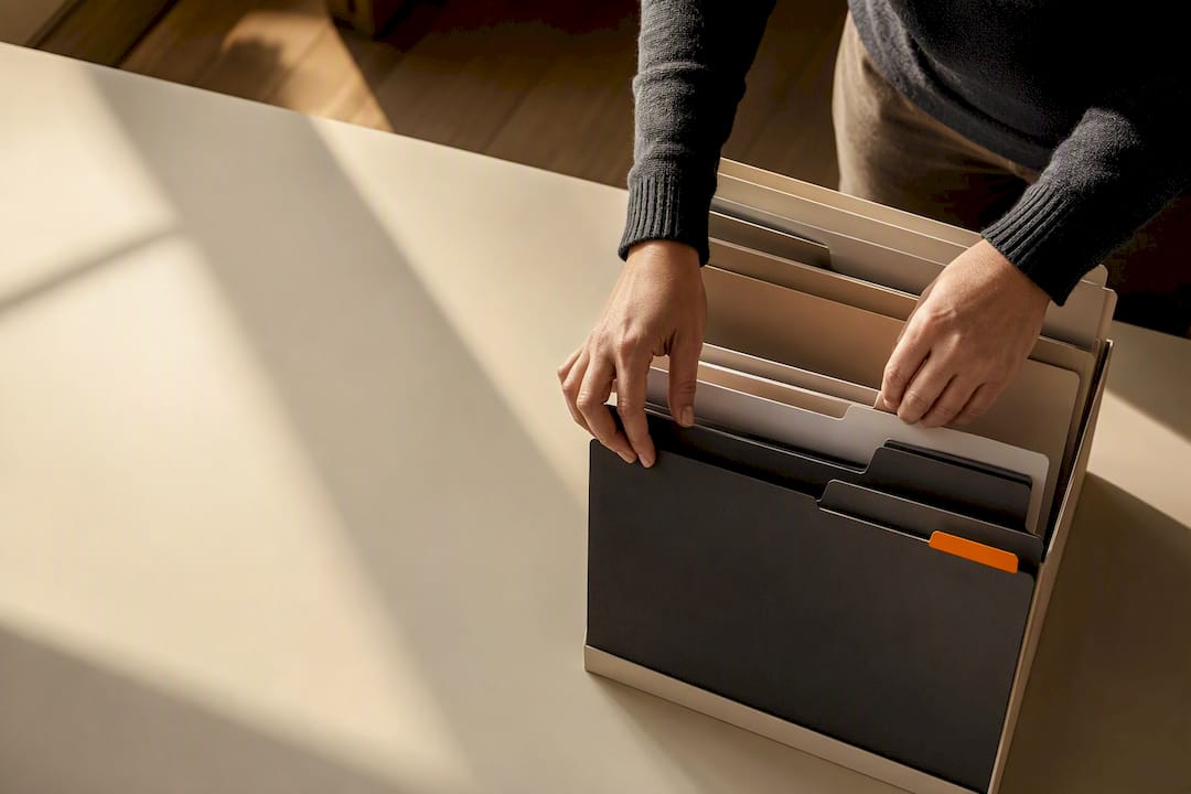 Caregiver organizing disability evidence folders