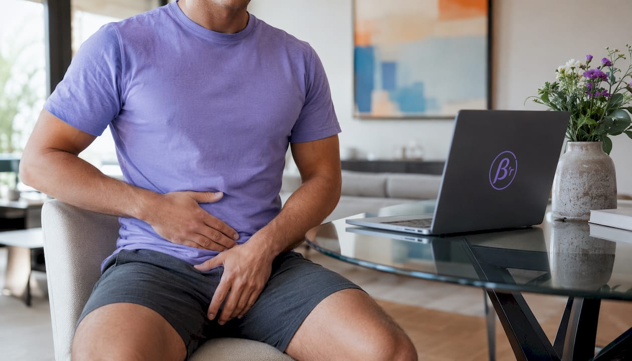 Hands demonstrating pelvic floor muscle location