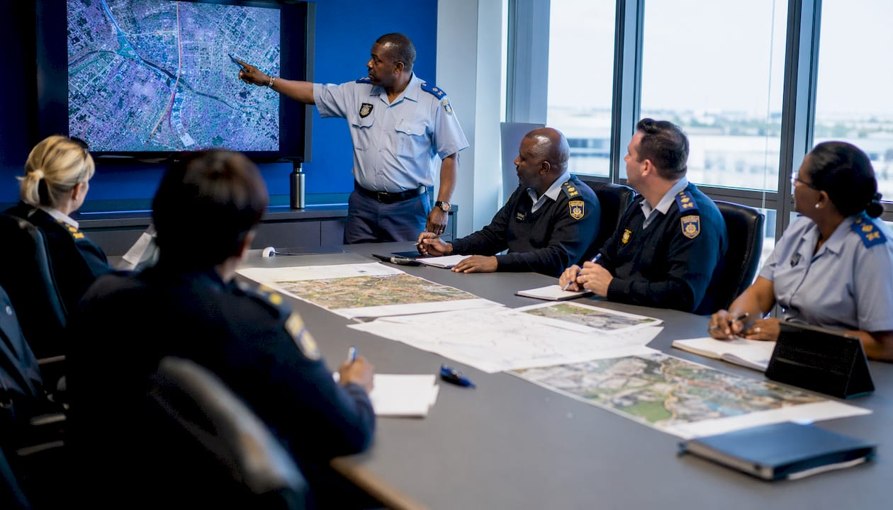 Security operatives in briefing room