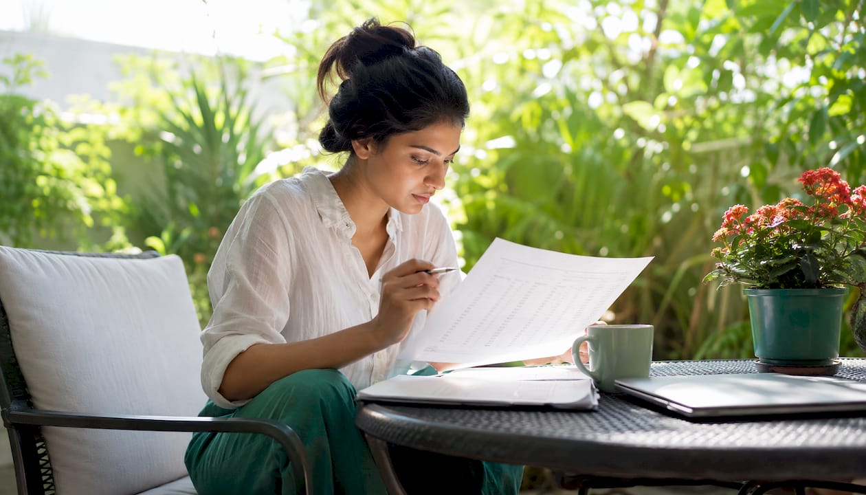 Woman practicing Excel datasets at home desk