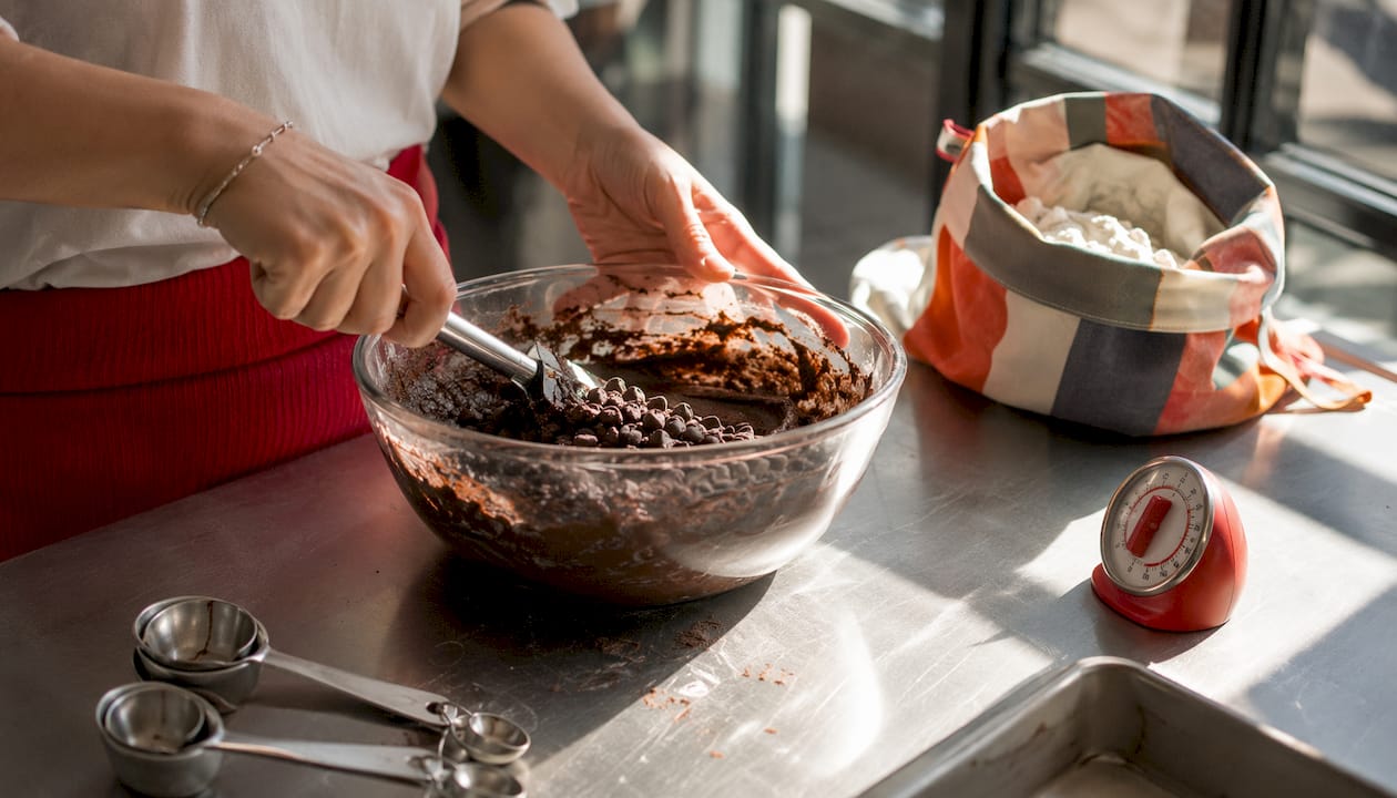 Overhead view of gluten free brownie batter mixing